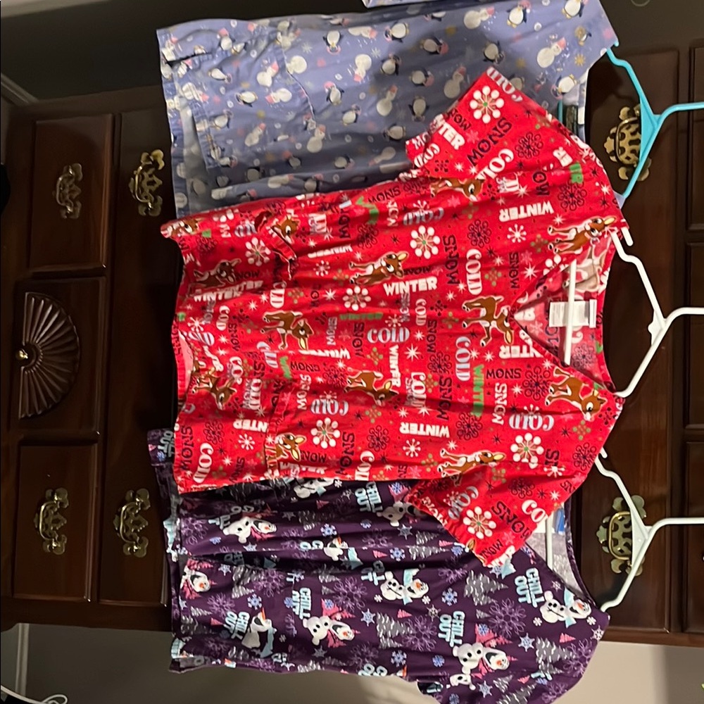 Three Christmas themed Scrub tops